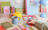 Colourful stationery desk set up.