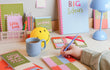 Colourful stationery desk set up.