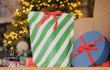 Wrapped presents under a Christmas tree.