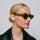 A Kjaerbede Winnie Sunglasses - Light Olive Transparent lifestyle