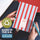A striped 2027 daily planner with red and white vertical stripes, held by two hands over dark denim jeans. The planner has a cream label on the front reading '2027 DIARY'.