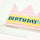 Birthday card with colorful text and a pink envelope on a white background