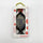 A reusable chemical hand warmer shaped like a soy sauce fish bottle with gold details, presented inside its white packaging box with red floral patterns and a gold hanging loop.